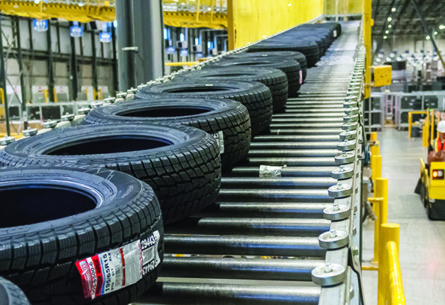 tires-on-conveyor-in-automated-DC-automated-solutions