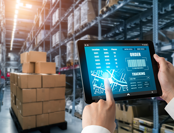 warehouse-worker-with-pad-with-supply-chain-view