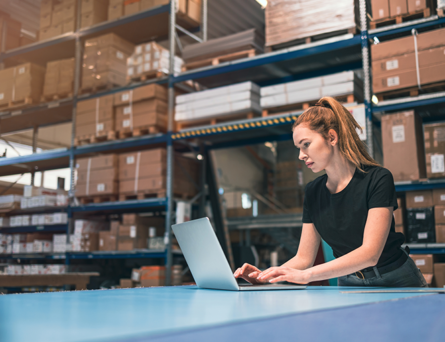 warehouse-worker-on-laptop-spreadsheet-slotting