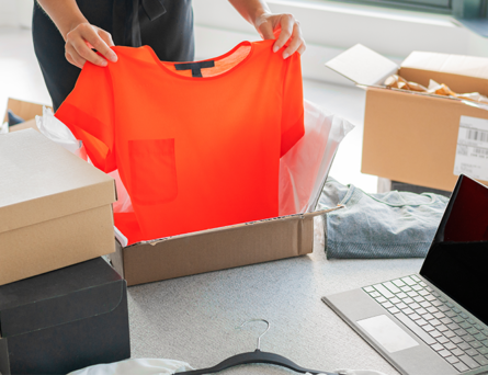 shirt-being-placed-in-box-for-return
