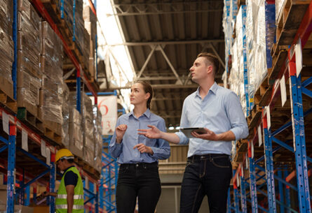 workers-reviewing-inventory-in-warehouse-peak-readiness
