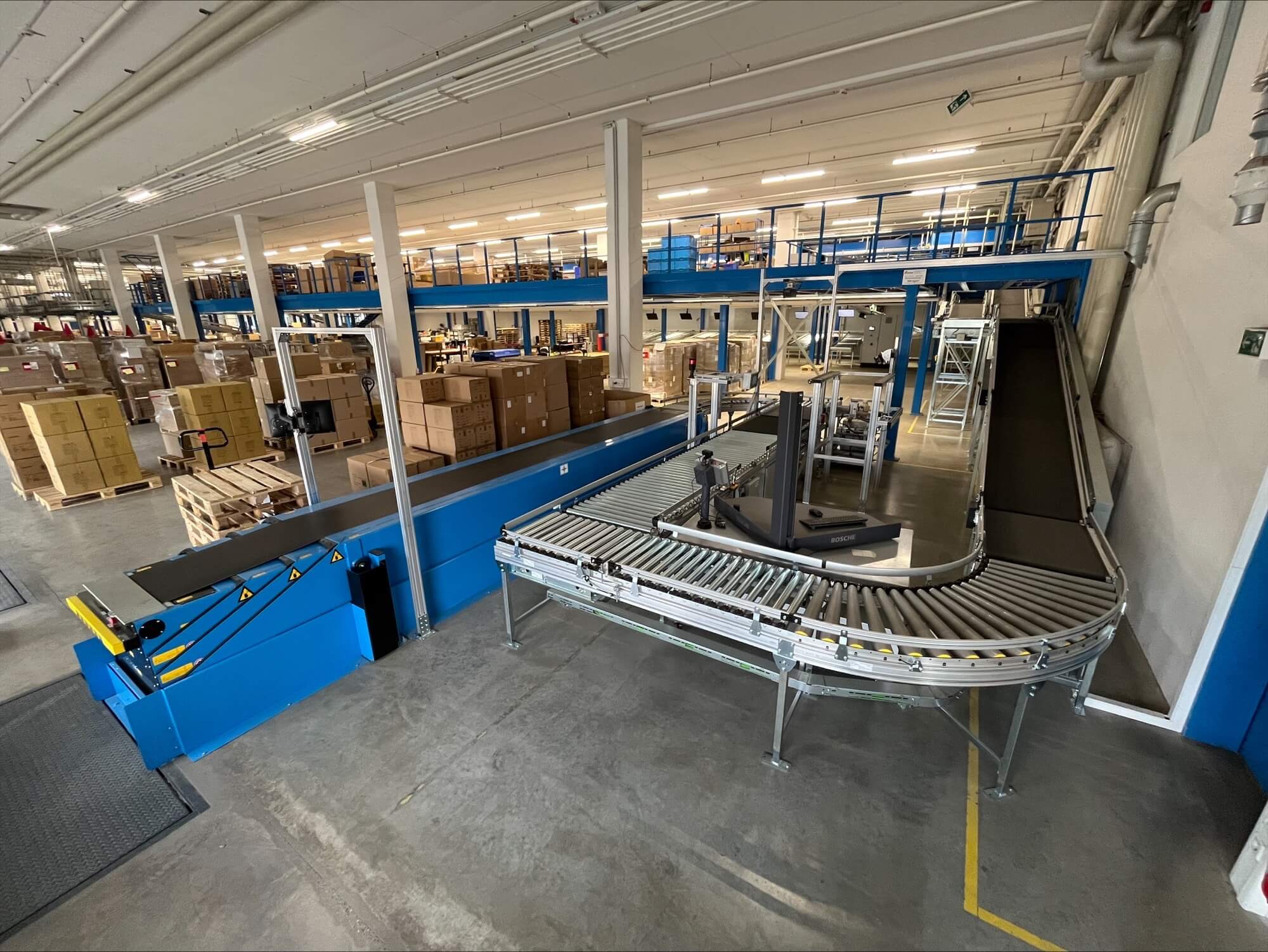 Betzold automated carton warehouse conveyor technology