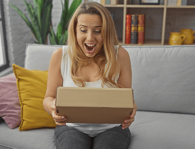 Women excited to receive a right-sized package - FORTNA