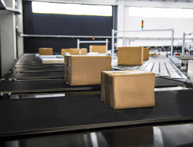 FORTNA cross-belt sorting system transports parcels through facility- FORTNA