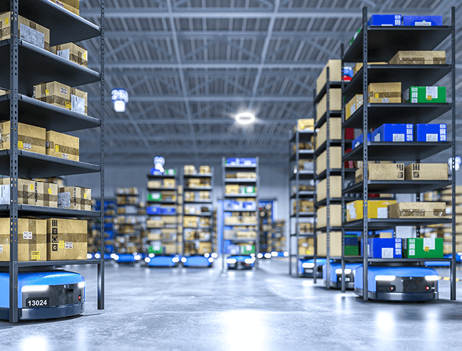 Automated guided vehicles (AGVs) transporting product through warehouse - FORTNA
