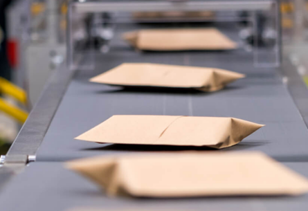 Sitma End-of-Line Mailer Packaging Automation Optimizes Package Handling | FORTNA