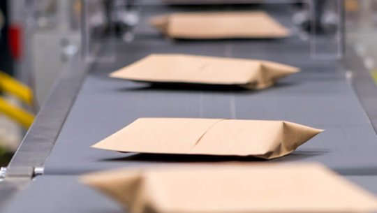 Sitma End-of-Line Mailer Packaging Automation Optimizes Package Handling | FORTNA